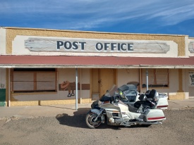 motorcycle sidecar in front of post office in texas, van horn
